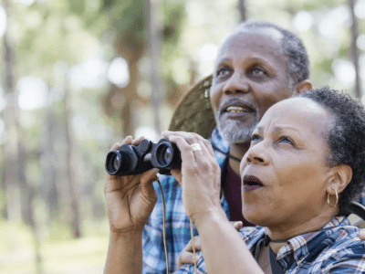 People looking through binoculars