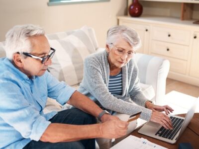 People looking at a computer