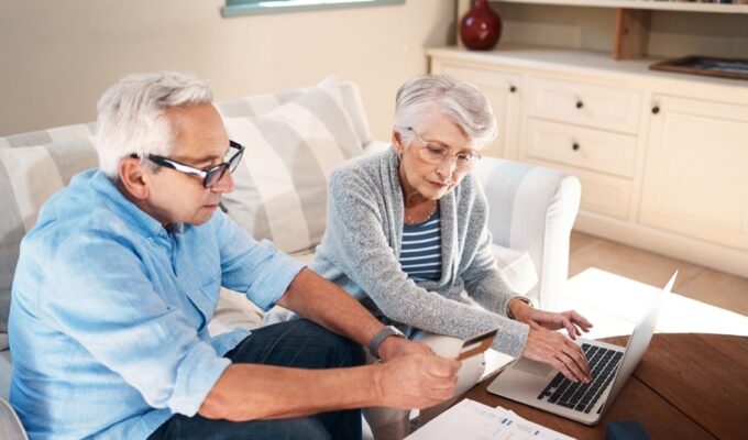 People looking at a computer