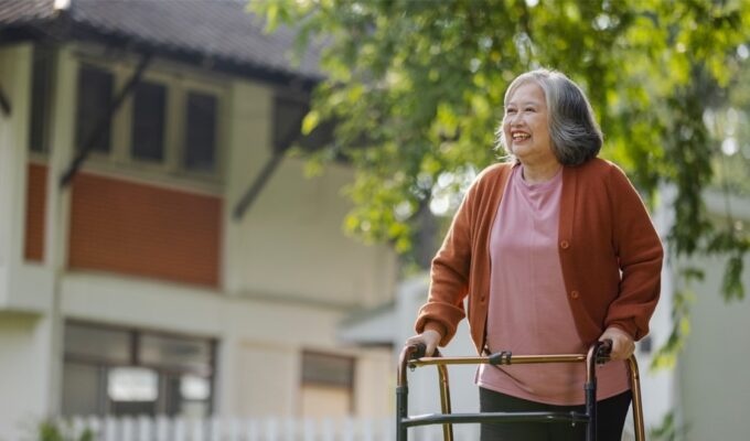 A person walking with a walker