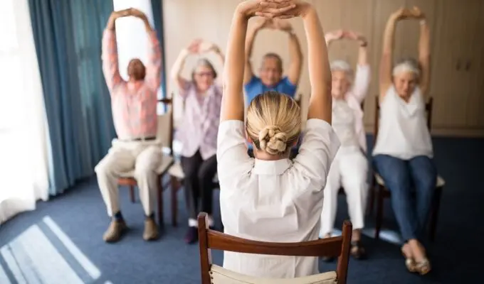 A group of people doing exercises