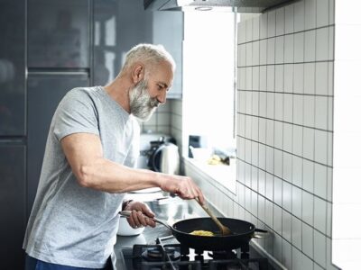 A person cooking in a kitchen