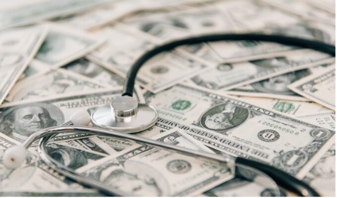 Image of dollars with a stethoscope