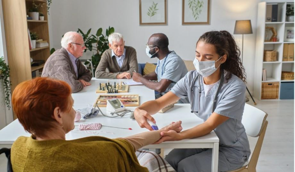 A nurse taking a blood pressure of a patient